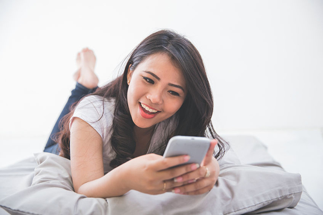 Young woman using smartphone